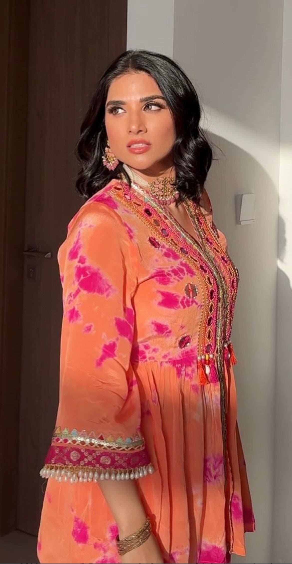 ORANGE & PINK TIE & DYE PEPLUM KURTA WITH COORDINATED SHARARA.