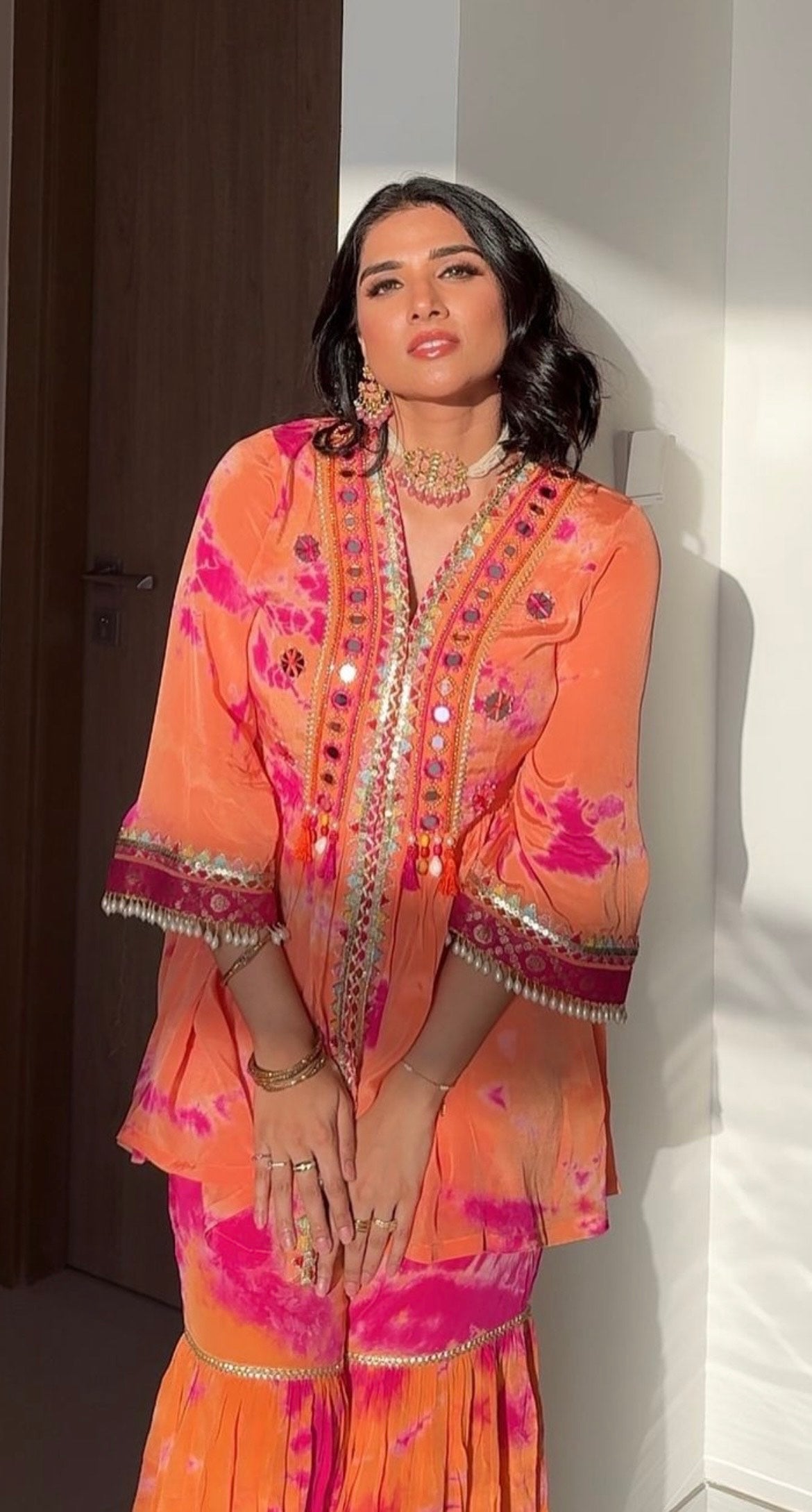 ORANGE & PINK TIE & DYE PEPLUM KURTA WITH COORDINATED SHARARA.